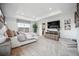 Spacious main bedroom with a tray ceiling, soft carpet, and a view of the outside at 693 Penn Rd, Elizabeth, CO 80107