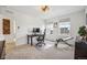 Office/bedroom with large windows, neutral colors and a ceiling fan at 693 Penn Rd, Elizabeth, CO 80107