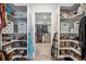 Custom built closet with shelving and hanging racks at 693 Penn Rd, Elizabeth, CO 80107