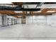 Unfinished basement with high ceilings and concrete floors at 48 Newport St, Denver, CO 80230