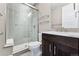 Modern bathroom with a walk-in shower and vanity at 48 Newport St, Denver, CO 80230