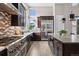 Modern kitchen with stainless steel appliances and ample counter space at 48 Newport St, Denver, CO 80230