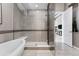 Walk-in shower with built-in bench and glass enclosure at 48 Newport St, Denver, CO 80230