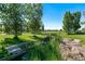 Landscaped park with a waterway and lush greenery at 48 Newport St, Denver, CO 80230