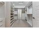 Large walk-in closet with ample shelving and hanging space at 48 Newport St, Denver, CO 80230