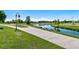 Scenic paved path alongside a pond or lake at 48 Newport St, Denver, CO 80230