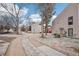 Exterior view showcasing a sidewalk and community landscaping at 3550 S Harlan St # 335, Denver, CO 80235