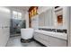 Modern bathroom featuring a soaking tub, walk-in shower, and double vanity at 1510 Wazee St # 3, Denver, CO 80202