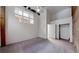 Bedroom featuring carpeted floor, high ceilings, closet, and ceiling fan at 1510 Wazee St # 3, Denver, CO 80202