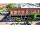 Exterior of historic brick building featuring street-level retail and upper-level residential units at 1510 Wazee St # 3, Denver, CO 80202