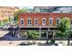 Brick building exterior with street-level retail and apartments, showcasing a blend of classic and modern architecture at 1510 Wazee St # 3, Denver, CO 80202