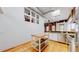 Bright, modern kitchen features stainless steel appliances, light wood floors, and an island at 1510 Wazee St # 3, Denver, CO 80202