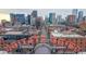 An urban skyline view with downtown buildings and the orange letters of Elitch Gardens at 1510 Wazee St # 3, Denver, CO 80202