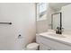 Modern bathroom featuring a vanity, toilet, walk-in shower with black trim, and neutral decor at 1714 Morgan Dr, Erie, CO 80516