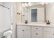 Bathroom featuring a double vanity, modern fixtures, and a nearby shower/tub, offering convenience and style at 1714 Morgan Dr, Erie, CO 80516