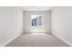 Neutral bedroom with carpet flooring and natural light at 1714 Morgan Dr, Erie, CO 80516
