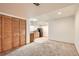 Finished basement with a kitchenette, offering extra storage and living space at 2307 S Ensenada St, Aurora, CO 80013