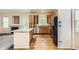 Functional kitchen with stainless steel appliances, granite countertops, and a center island at 2307 S Ensenada St, Aurora, CO 80013