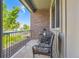 Cozy balcony featuring a charming seating area, perfect for enjoying outdoor views and relaxation at 504 E Dry Creek Pl, Littleton, CO 80122