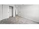 Bedroom featuring neutral carpet and closet with sliding doors at 17117 W 91St Ln, Arvada, CO 80007