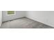 Bedroom showcasing neutral carpet, white walls, and window letting in natural light at 17117 W 91St Ln, Arvada, CO 80007