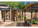 Eclectic outbuilding featuring unique designs and colorful accents, adding charm to the garden area at 740 Carr St, Lakewood, CO 80214