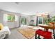 Bright basement with carpet floors, white walls, natural light, and access to the outdoors at 1315 Tipperary St, Boulder, CO 80303