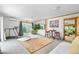 Finished basement with workout area, stylish rug, and access to an outdoor garden at 1315 Tipperary St, Boulder, CO 80303