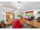 Open concept living room with dining area and hardwood floors, bright with natural light at 1315 Tipperary St, Boulder, CO 80303