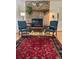 Cozy living room with a brick fireplace and comfortable seating, perfect for relaxing at 1315 Tipperary St, Boulder, CO 80303