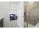 Bathroom view to bedroom and clear glass walk-in shower at 8073 Mt Lincoln Rd, Littleton, CO 80125