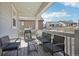 Covered patio with outdoor seating, barbecue, providing a cozy space for relaxation and entertainment at 8073 Mt Lincoln Rd, Littleton, CO 80125