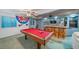Finished basement features a pool table and bar area for entertainment at 9505 Painted Canyon Cir, Highlands Ranch, CO 80129