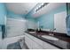 This inviting bathroom features a soaking tub with shower and vanity with dual sinks at 9505 Painted Canyon Cir, Highlands Ranch, CO 80129