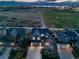 Beautiful home exterior with a well-maintained lawn and landscape, showcasing curb appeal in the neighborhood at 9505 Painted Canyon Cir, Highlands Ranch, CO 80129