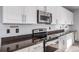Bright kitchen with stainless steel appliances, granite countertops, and modern cabinetry at 9505 Painted Canyon Cir, Highlands Ranch, CO 80129