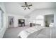 Bright main bedroom boasts vaulted ceilings, neutral paint, and a door to a private deck at 9505 Painted Canyon Cir, Highlands Ranch, CO 80129