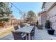 Outdoor patio with a dining table, seating, and string lights, perfect for entertaining at 14032 Park Cove Dr, Broomfield, CO 80023