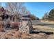 Street view of the community entrance sign under a blue sky at 14032 Park Cove Dr, Broomfield, CO 80023