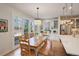 Eat-in kitchen with natural light, wooden table and bench seating at 14032 Park Cove Dr, Broomfield, CO 80023