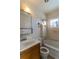 Bathroom with shower/tub combo and vanity at 6661 Clermont St, Commerce City, CO 80022