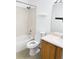 Bathroom featuring a toilet, sink and a shower-tub combo at 20401 E Chenango Pl, Aurora, CO 80015