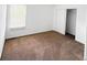 Bedroom with neutral carpet, natural light, and closet at 20401 E Chenango Pl, Aurora, CO 80015