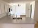 Large kitchen featuring white cabinets, countertops, and stainless appliances at 20401 E Chenango Pl, Aurora, CO 80015