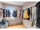 View of closet space with ample storage, hardwood floor, and window at 9135 Bellaire St, Thornton, CO 80229