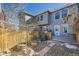 Fenced-in backyard with wood deck and patio area, showing a nice outdoor space at 624 S Depew St # C, Lakewood, CO 80226