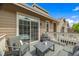 Cozy outdoor deck with comfortable seating, perfect for relaxation and enjoying the fresh air at 6813 W Yale Ave, Lakewood, CO 80227