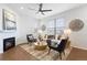 Inviting living area featuring fireplace, large window, and neutral decor at 8251 W 54Th Ave # 4, Arvada, CO 80002