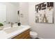 Chic powder room featuring a quartz countertop and modern faucet at 8251 W 54Th Ave # 4, Arvada, CO 80002