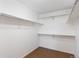 Spacious walk-in closet with hardwood floor and built in shelving at 8251 W 54Th Ave # 4, Arvada, CO 80002